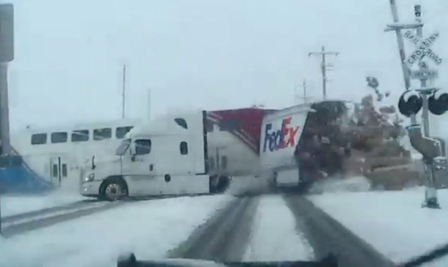 Utah passenger train hits FedEx truck